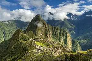 Peruvian Prints: Historic ancient archeological Incan Machu Picchu on mountain in Andes, Cuzco Region
