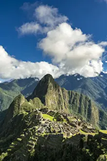 Historic ancient Incan Machu Picchu on mountain in Andes, Cuzco Region, Peru