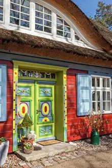 Prerow Prints: Historic beautifully decorated red thatched cottage in Prerow