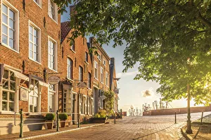 Northern German Prints: Historic brick houses at the harbor in Greetsiel, East Frisia, Lower Saxony, Germany