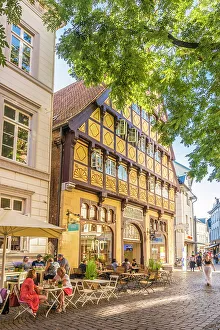 Summer Evening Prints: Historic Degodehaus from 1502 in the old town of Oldenburg