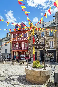 Fountain Prints: Historic houses on Rue des Vierges in the old town of Josselin, Morbihan, Brittany, France