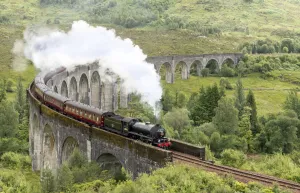 Harry Potter Prints: Historic steam train The Jacobite on the Glenfinnan Viaduct, Highlands, Scotland
