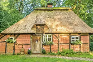 Half Timbering Prints: Historic thatched half-timbered house Witch house in the village of Wesel
