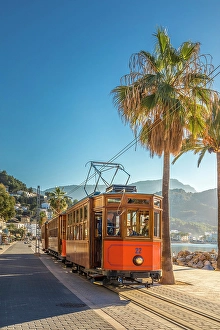 Historic tram on the waterfront promenade of Port de Soller, Mallorca, Balearic Islands, Spain