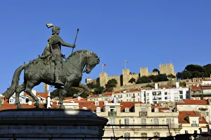 The historical centre and the Sao Jorge castle, with King Dom Joao I equestrian statue
