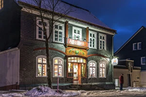 Advent Gallery: Historical pharmacy in the old town of Winterberg on a winter evening, Sauerland