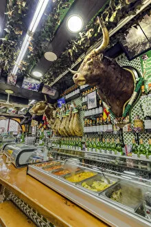 Images Dated 24th March 2018: Historical tapas bar adorned with traditional bullfighting memorabilia, Madrid, Community of Madrid