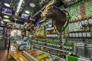 Historical tapas bar adorned with traditional bullfighting memorabilia, Madrid, Community of Madrid
