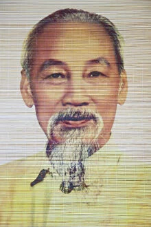 Ho Chi Minh portrait on bamboo scroll, Hanoi, Vietnam