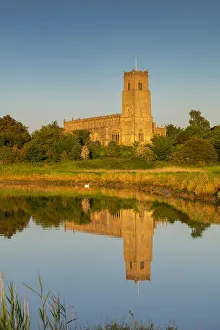 Holy Trinity Church Reflecting in River Blyth, Blythburgh, Suffolk, England