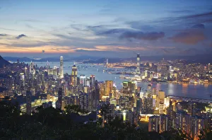 Images Dated 19th September 2011: Hong Kong Island and Kowloon skylines at sunset, Hong Kong, China