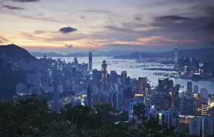 Hong Kong Island and Kowloon skylines at sunset, Hong Kong, China