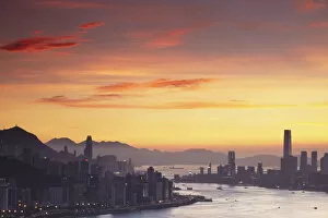 Hong Kong Island and Tsim Sha Tsui skylines at sunset, Hong Kong, China