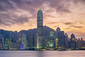 Hong Kong skyline, skyscrapers on Hong Kong Island skyline at sunset seen from Tsim