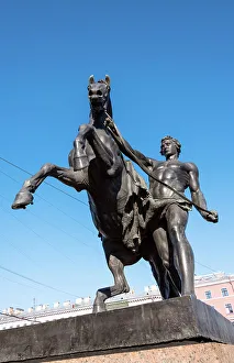 Attractions Prints: One of four Horse Tamers on the Anichkov most (Anichkov Bridge), Saint Petersburg, Russia
