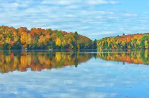 Seasons Gallery: Horseshoe Lake in autumn with cottage, Near Parry Sound, Ontario, Canada