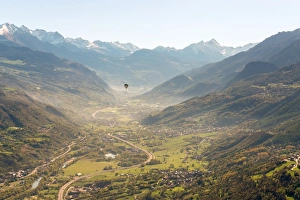 Aosta Prints: hot air balloon flies over Aosta city, Valle d Aosta, Italy, Europe