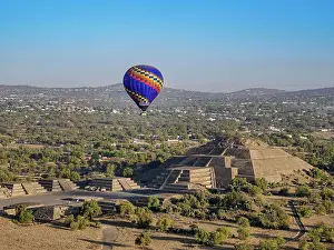 Balloon Prints: Hot air balloon flying over the Avenue of the Dead and the Pyramid of the Moon at sunrise