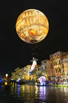 Crowd Gallery: Hot-air balloon is the main attraction of the open cerimony of the Venice carnival
