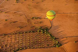 Country Prints: Hot air balloon over the Moroccan landscape, Marrakech, Morocco