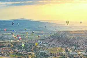 Turkish Prints: Hot air balloons over Cappadocia at a misty sunrise
