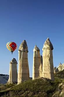 Eroded Collection: Hot Air Balloons & Fairy Chimneys in Honey Valley, near Goreme, Cappadocia, Turkey