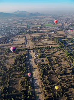 Balloon Prints: Hot air balloons flying over the Avenue of the Dead at sunrise