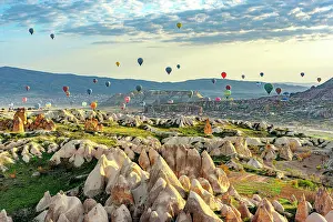 Turkish Prints: Hot air balloons flying over fairy chimneys, Cappadocia, Central Anatolia, Turkey