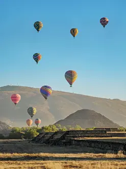 Flight Prints: Hot air balloons flying over the Pyramid of the Sun at sunrise