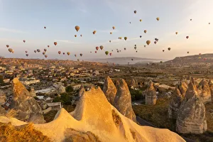 Touristic Attraction Prints: Hot air balloons flying in the sky of Goreme. Capadocia, Kaisery district, Anatolia