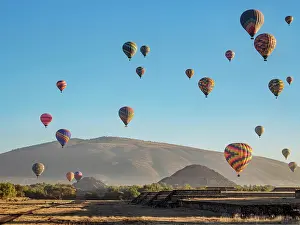 Balloon Prints: Hot air balloons flying over the Teotihuacan Archaeological Site at sunrise
