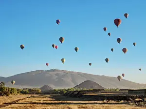 Balloon Prints: Hot air balloons flying over the Teotihuacan Archaeological Site at sunrise