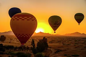 Hot Air Balloon Prints: Hot air balloons lifting off at dawn, Marrakech, Morocco