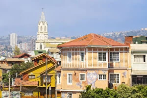 House with painted mural and Parroquia Las Carmelitas church in background, Valparaiso, Valparaiso Province