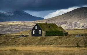 Images Dated 20th September 2019: House with roof covered by grass against mountains, South Iceland, Iceland