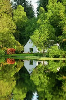 Aberfoyle Gallery: House amongst trees with reflections, Loch Ard, Aberfoyle, Stirling, Perthshire, Scotland, UK