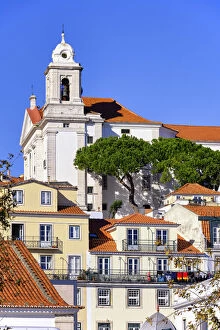 Houses and church in Alfama, a traditional district of Lisbon. Portugal