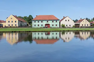 Baroque Style Prints: Houses in the historical village of Holasovice reflected in the Roubaicek pond