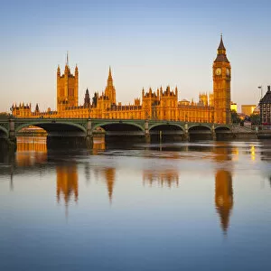 Images Dated 12th July 2013: The Houses of Parliament & The River Thames illuminated at sunrise