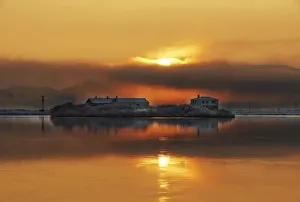 Relfections Prints: Houses on a small island in the Myvatn lake, northern Iceland