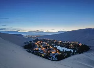 Blue Sky Gallery: Huacachina Oasis at twilight, elevated view, Ica Region, Peru