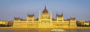 Hungarian Parliament Building & The River Danube illuminated at Sunset, Budapest