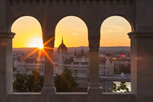 Hungary, Central Hungary, Budapest. Sunrise over the Hungarian Parliament Building