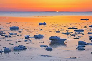 Prairie Province Prints: Ice on shore of Lake Winnipeg in spring at sunrise Winnipeg Beach, Manitoba, Canada