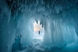 Images Dated 30th May 2018: Ice stalactites in a cave at the shore at sunset at lake Baikal, Irkutsk region, Siberia