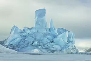 Images Dated 1st March 2021: Iceberg frozen in pack ice - Antarctica, Antarctic Peninsula, Snowhill Island