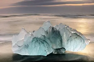 Icebergs Prints: Icebergs on the beach at sunrise, near Jokulsarlon glacial lagoon, Iceland