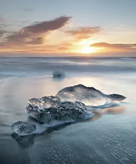 Icebergs Prints: Icebergs on the beach at sunrise, near Jokulsarlon glacial lagoon, Iceland