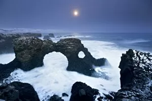 Images Dated 25th January 2013: Iceland, characteristic cliff overlooking the sea, illuminated by the moonlight